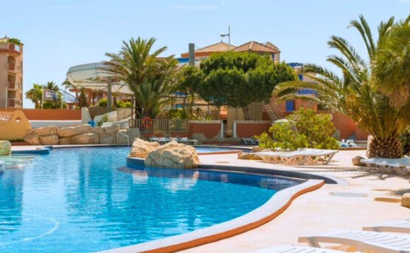 mar etang pool and palm trees